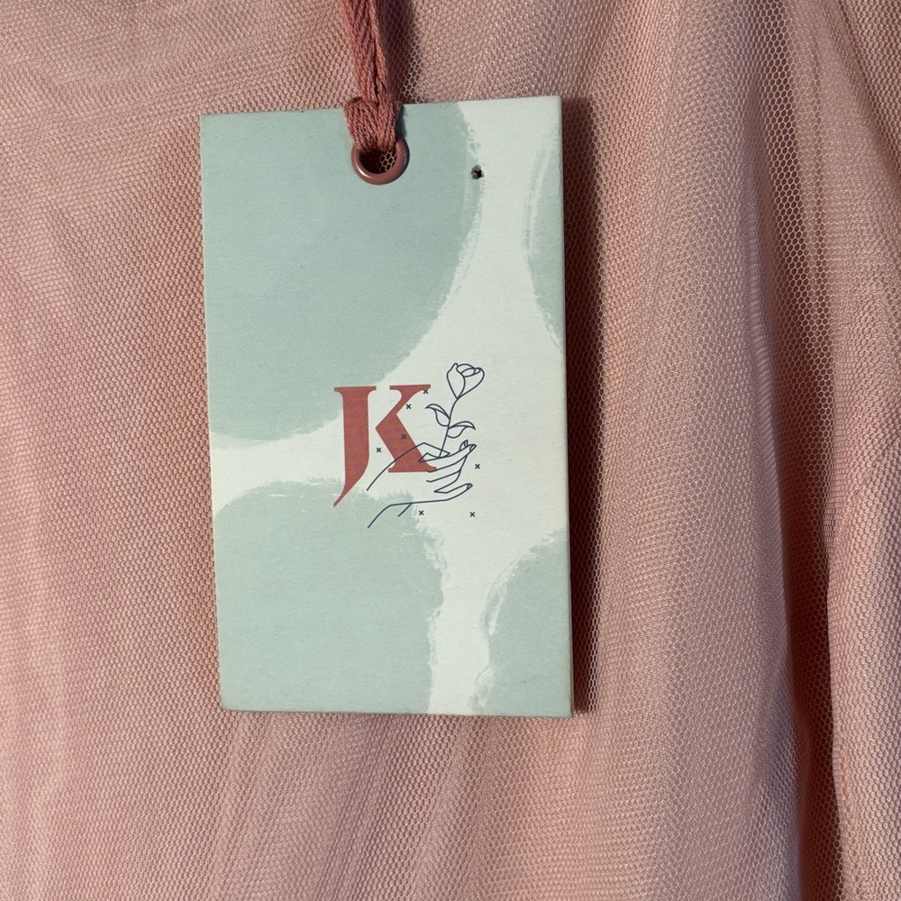 NWT JessaKae Allora Dress in Rose by the brand.
Color: Rose (a dusty pink)
Desi - Picture 11 of 11